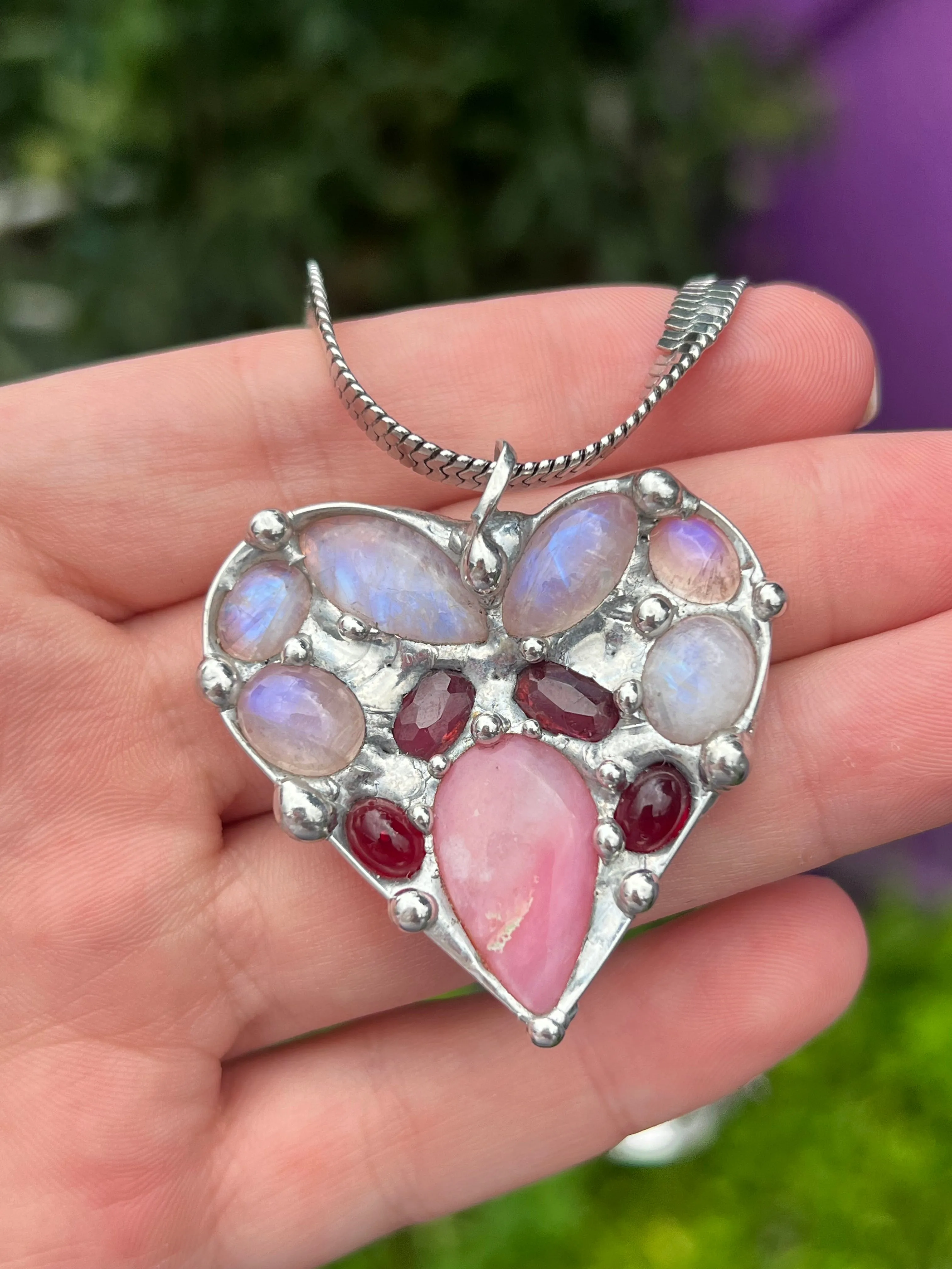 Crystal heart collage pendant