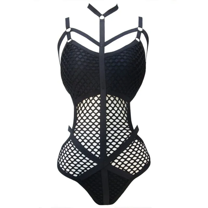 Certainly! Here is an optimized title with modifiers for the product:

Seductive Gothic Lace Fishnet Bodysuit with Long Sleeves