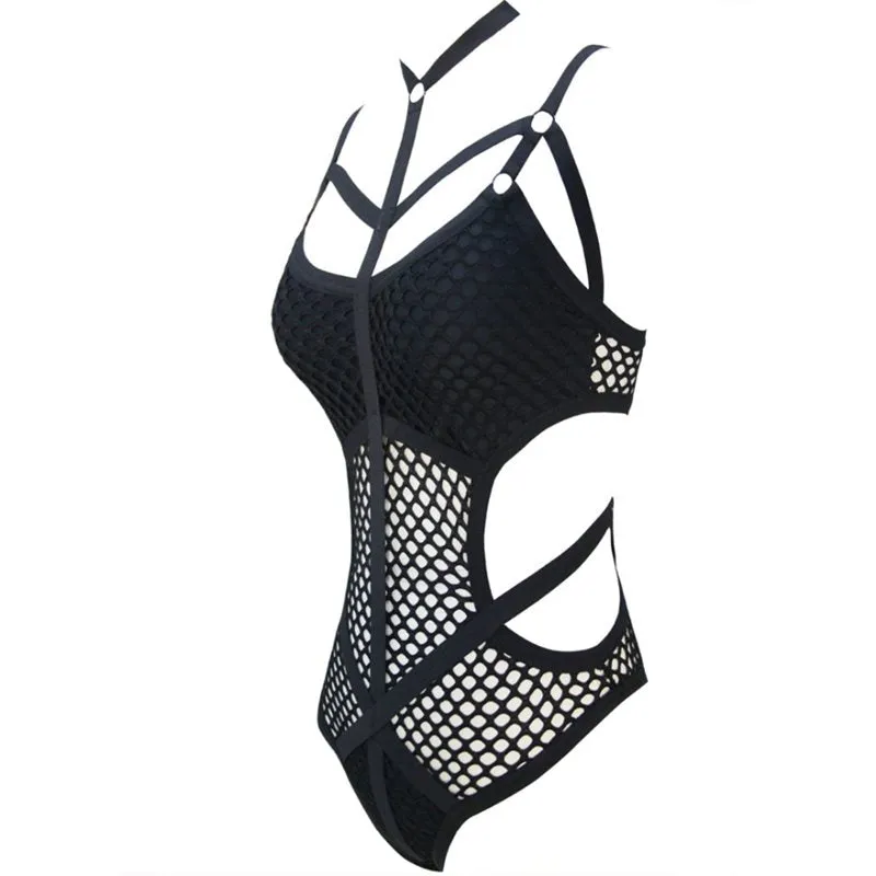 Certainly! Here is an optimized title with modifiers for the product:

Seductive Gothic Lace Fishnet Bodysuit with Long Sleeves