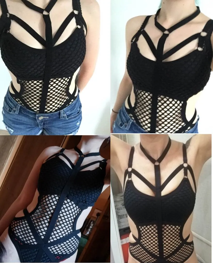 Certainly! Here is an optimized title with modifiers for the product:

Seductive Gothic Lace Fishnet Bodysuit with Long Sleeves