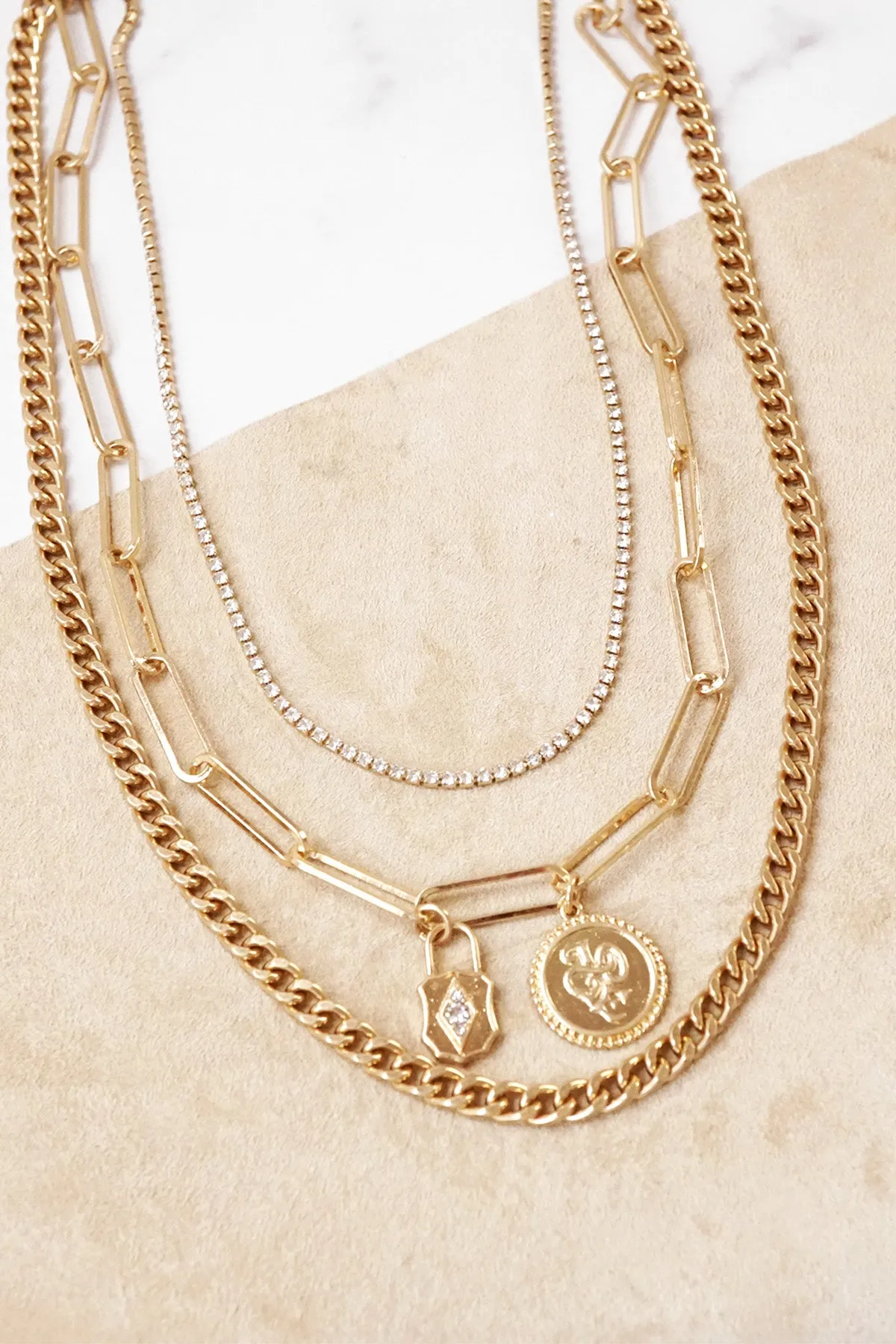 Multi Layer Chain Necklace Gold tone with small pendants