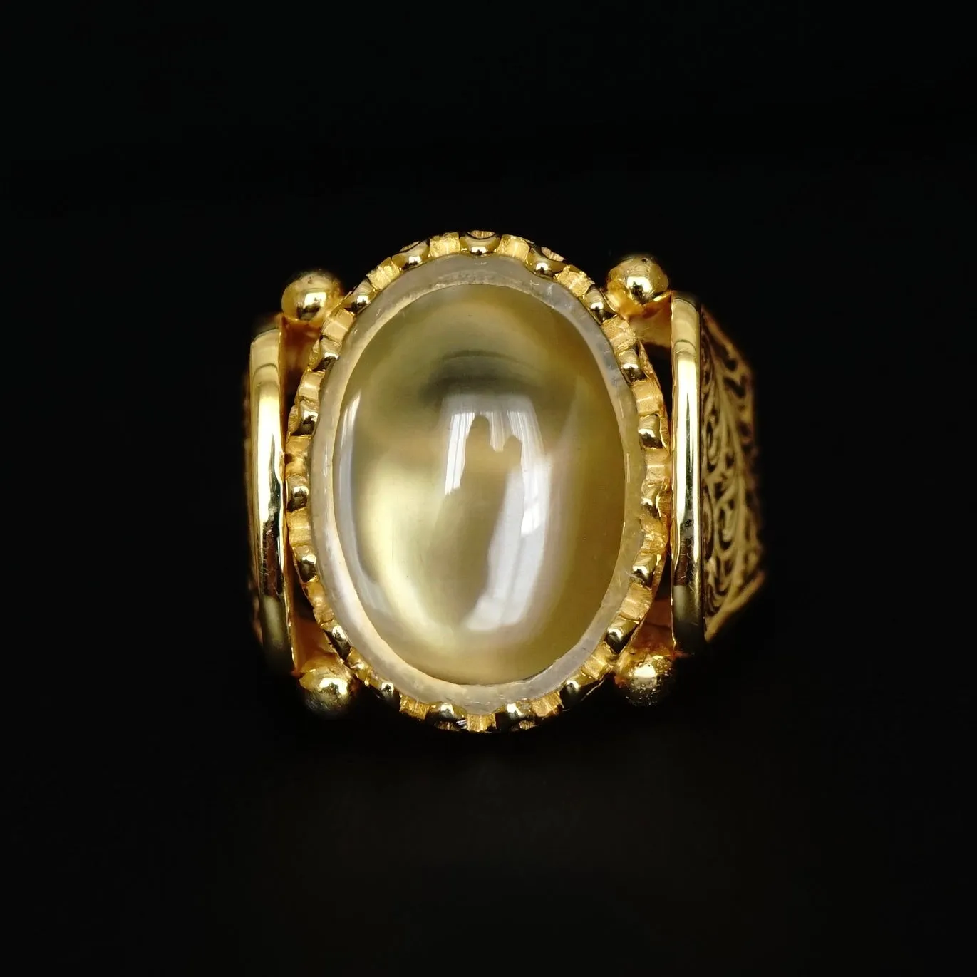 Certainly! Heres an optimized title for your e-commerce product:

**Handmade Unique 18K Yellow Gold Ring with Engraved Durr Al Najaf and Crystal Quartz**