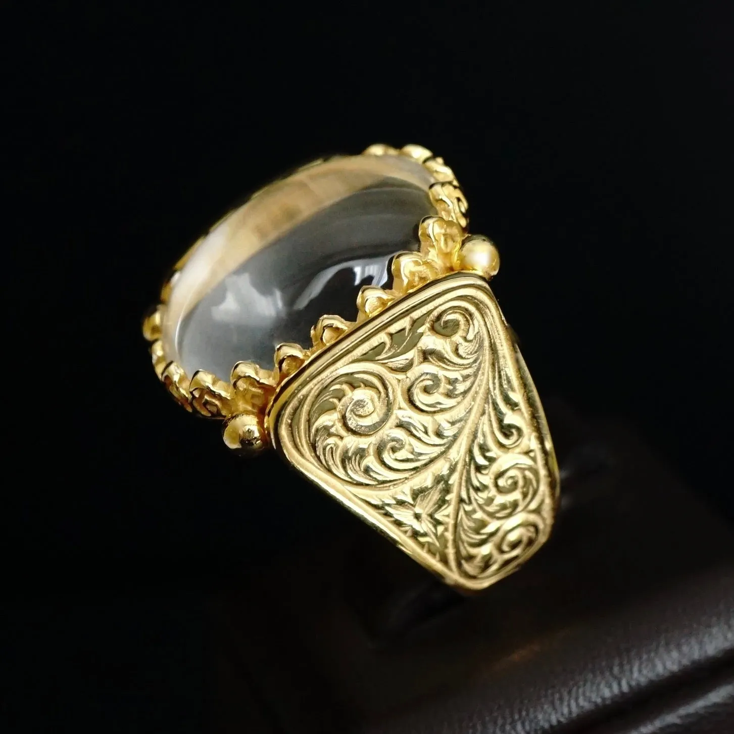 Certainly! Heres an optimized title for your e-commerce product:

**Handmade Unique 18K Yellow Gold Ring with Engraved Durr Al Najaf and Crystal Quartz**