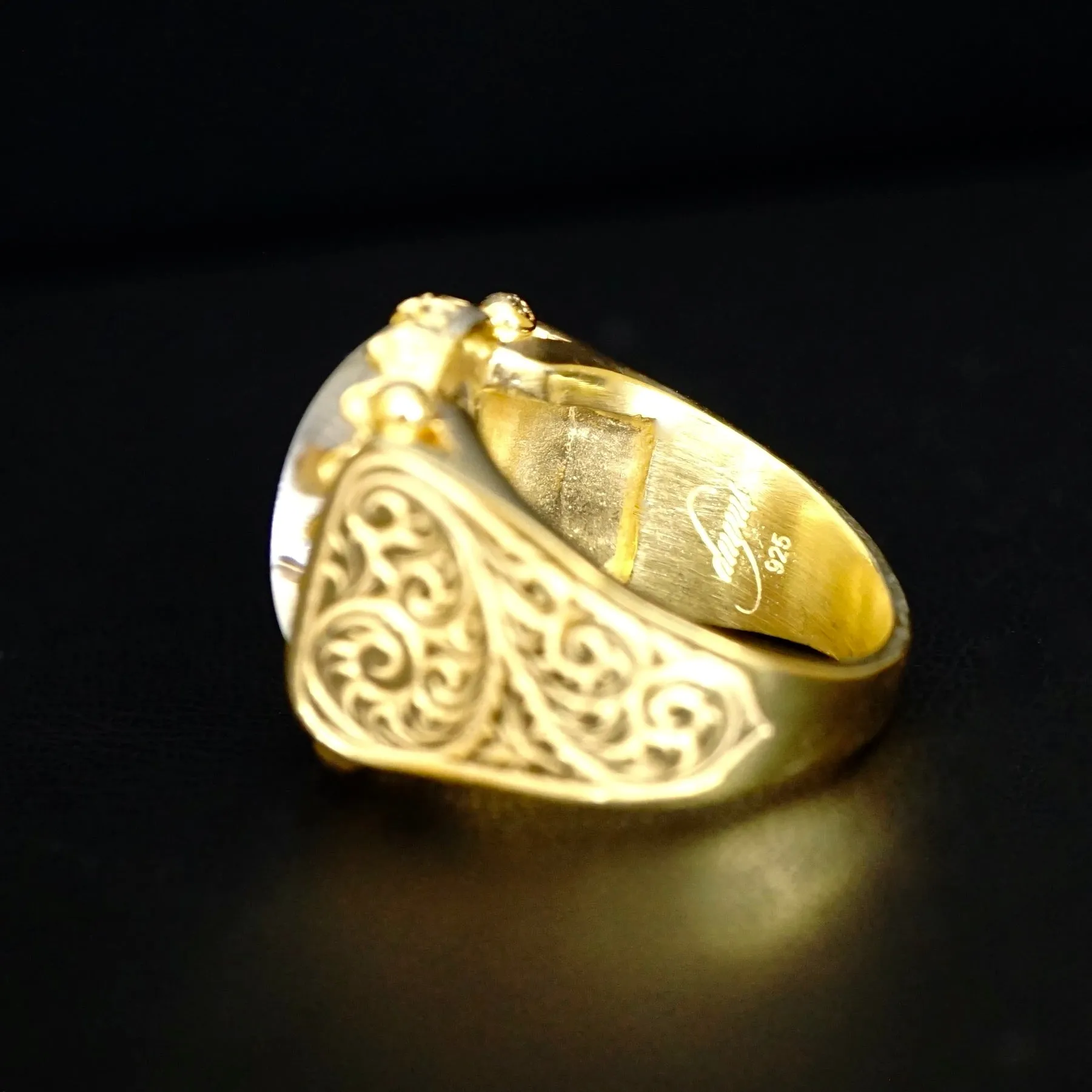 Certainly! Heres an optimized title for your e-commerce product:

**Handmade Unique 18K Yellow Gold Ring with Engraved Durr Al Najaf and Crystal Quartz**